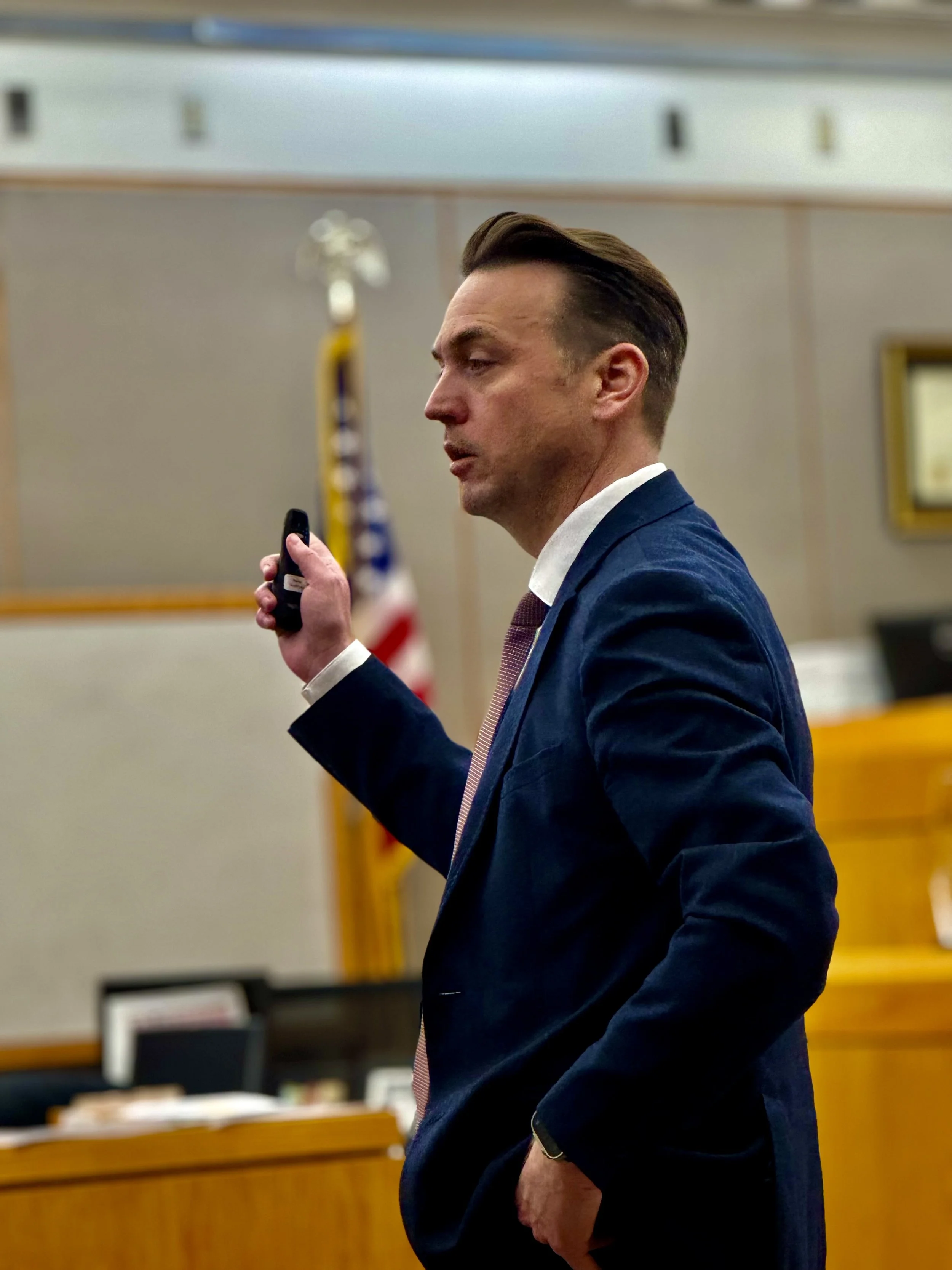 Aaron Veuleman presenting in a courtroom